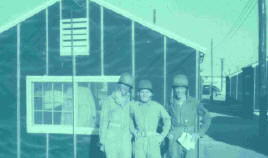 This picture was in a packet that cleared military censors in May 1945. Lt. John Lloyd is in the center.